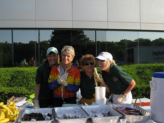 Volunteers serve breakfast